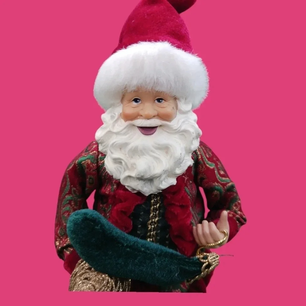 Vintage santa holding gold tree and boot